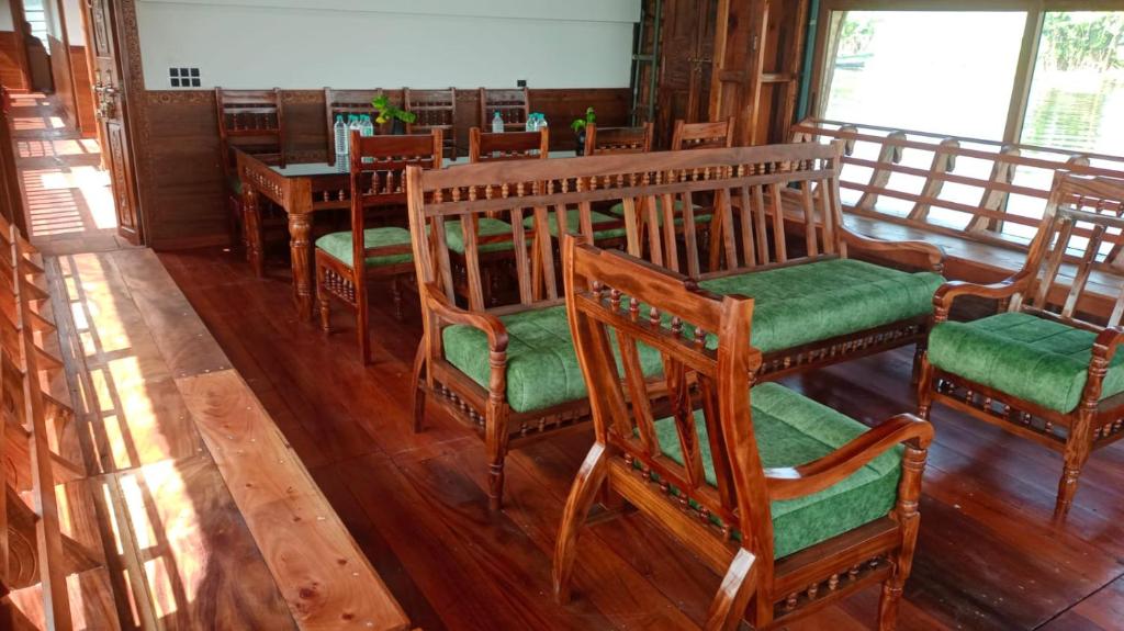Air-conditioned bedroom inside a private houseboat in Alleppey with premium furnishings